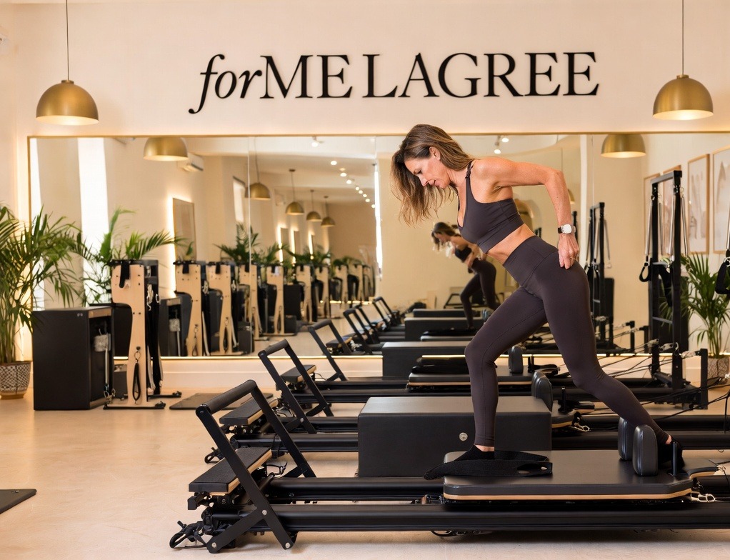 Woman training on a Megaformer at forME Lagree, a Lagree studio in Powell, Ohio